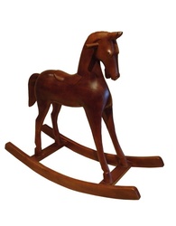 Cheval à bascule en bois sculpté
